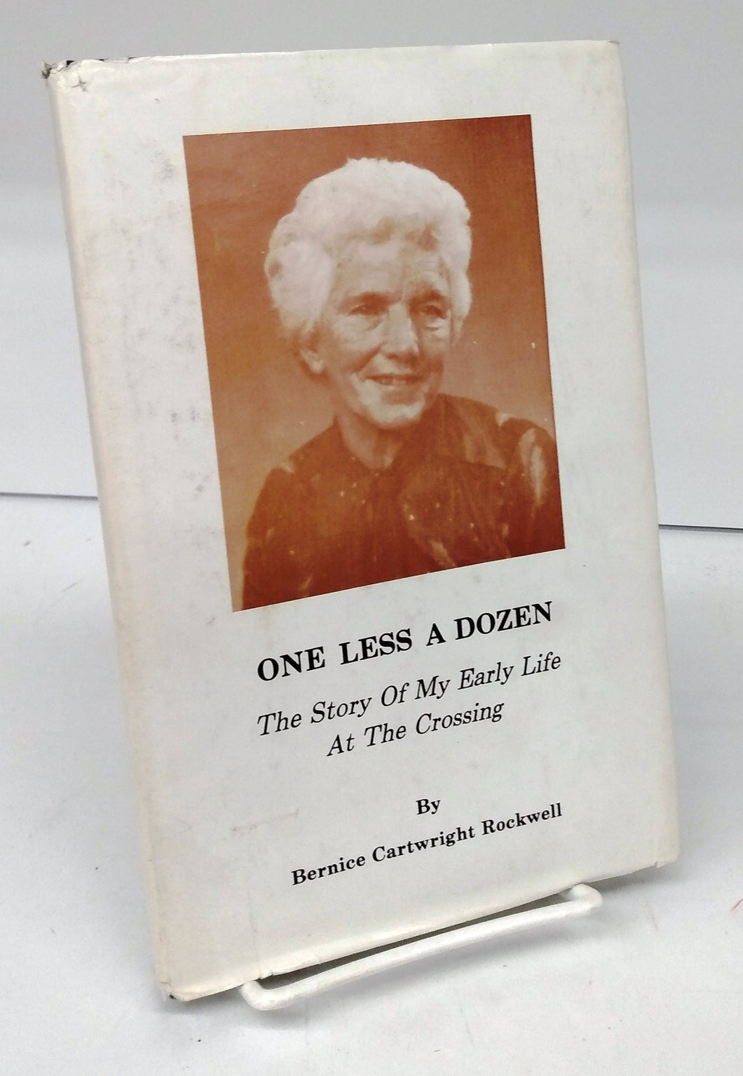 One Less A Dozen: The Story Of My Early Life At The Crossing