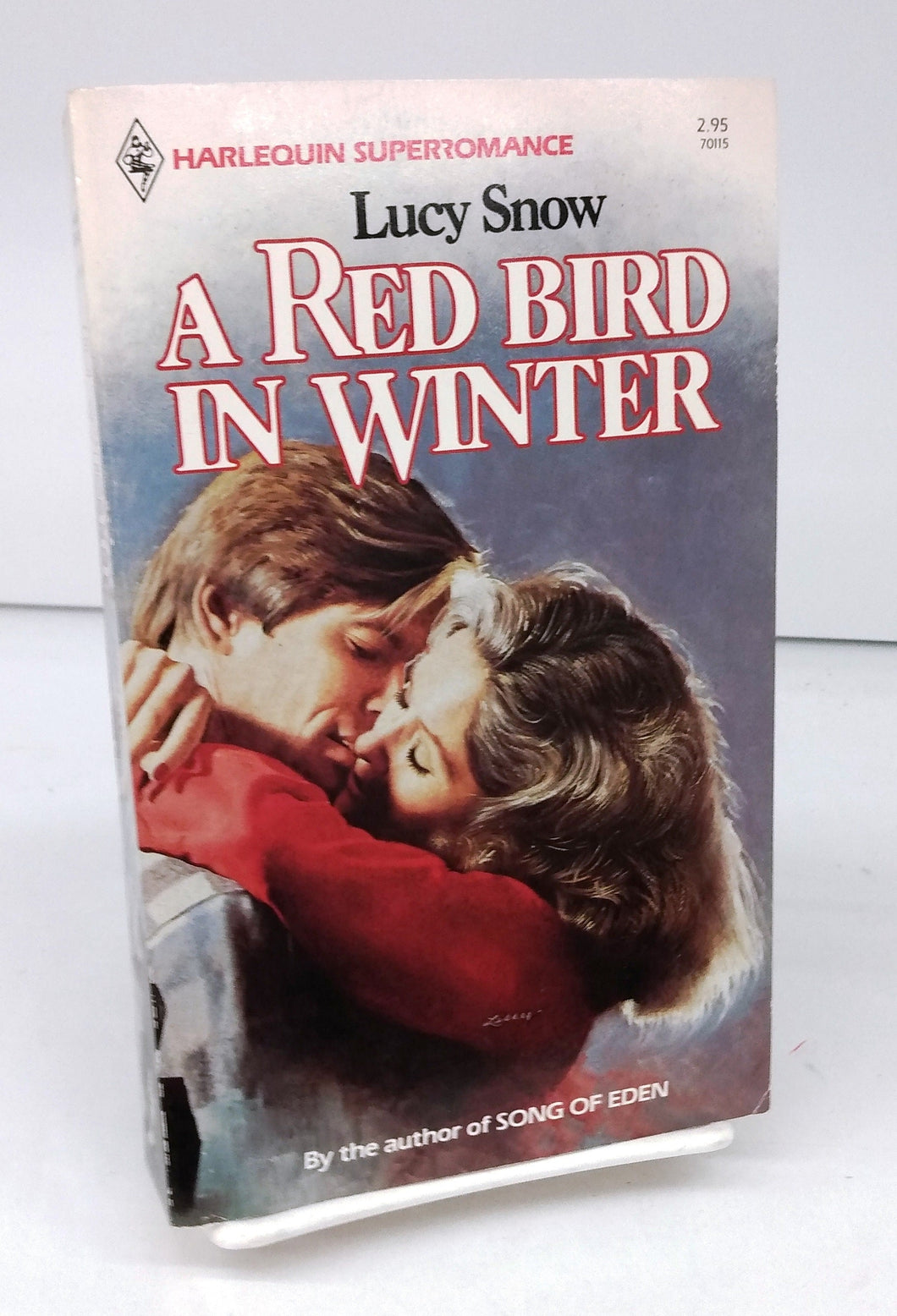A Red Bird in Winter