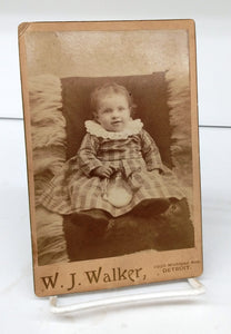 Photo of child with early baby bottle