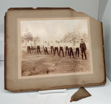Photograph of firemen with hose-reel cart
