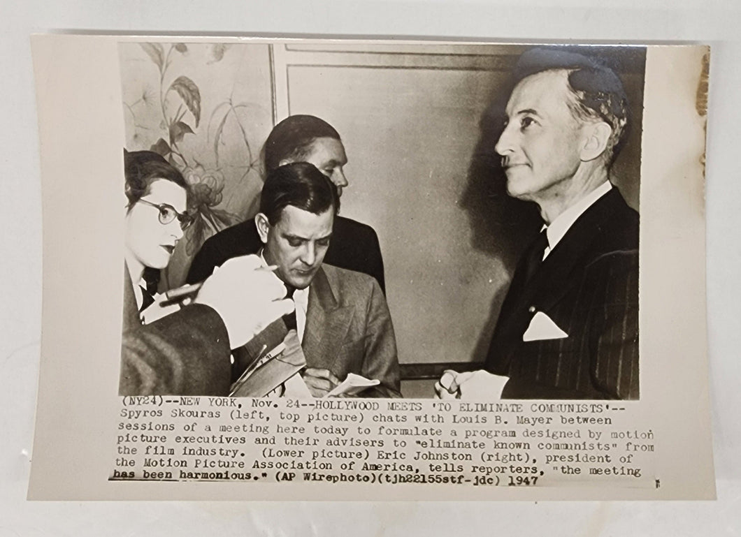 Photo of Eric Johnston, President of the Motion Picture Association of America, with reporters