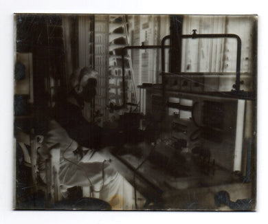 Glass negative of switchboard operator