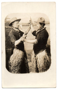 Photo postcard of two cowboys