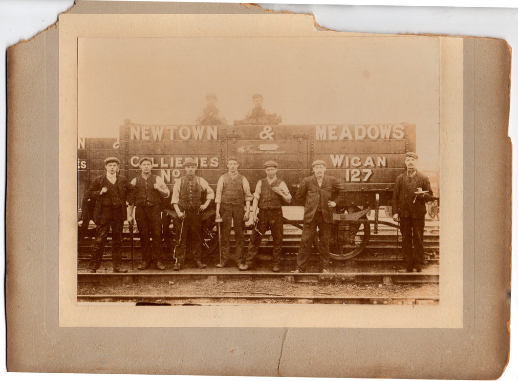 Photo of 9 men near Newtown & Meadows wagon car
