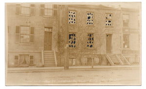 Photo postcard of building damaged during Hamilton, Ontario Street Railway strike